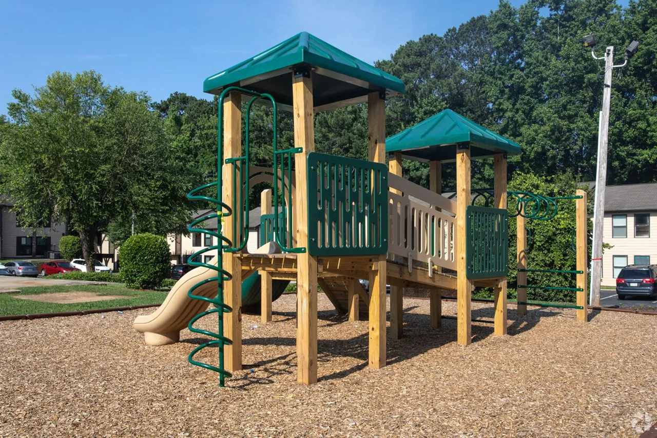 Playground with slides and covered play towers